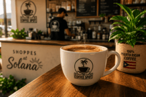 Freshly poured Puerto Rican coffee at The Coffee Spot 915 kiosk in El Paso with chocolate-caramel crema